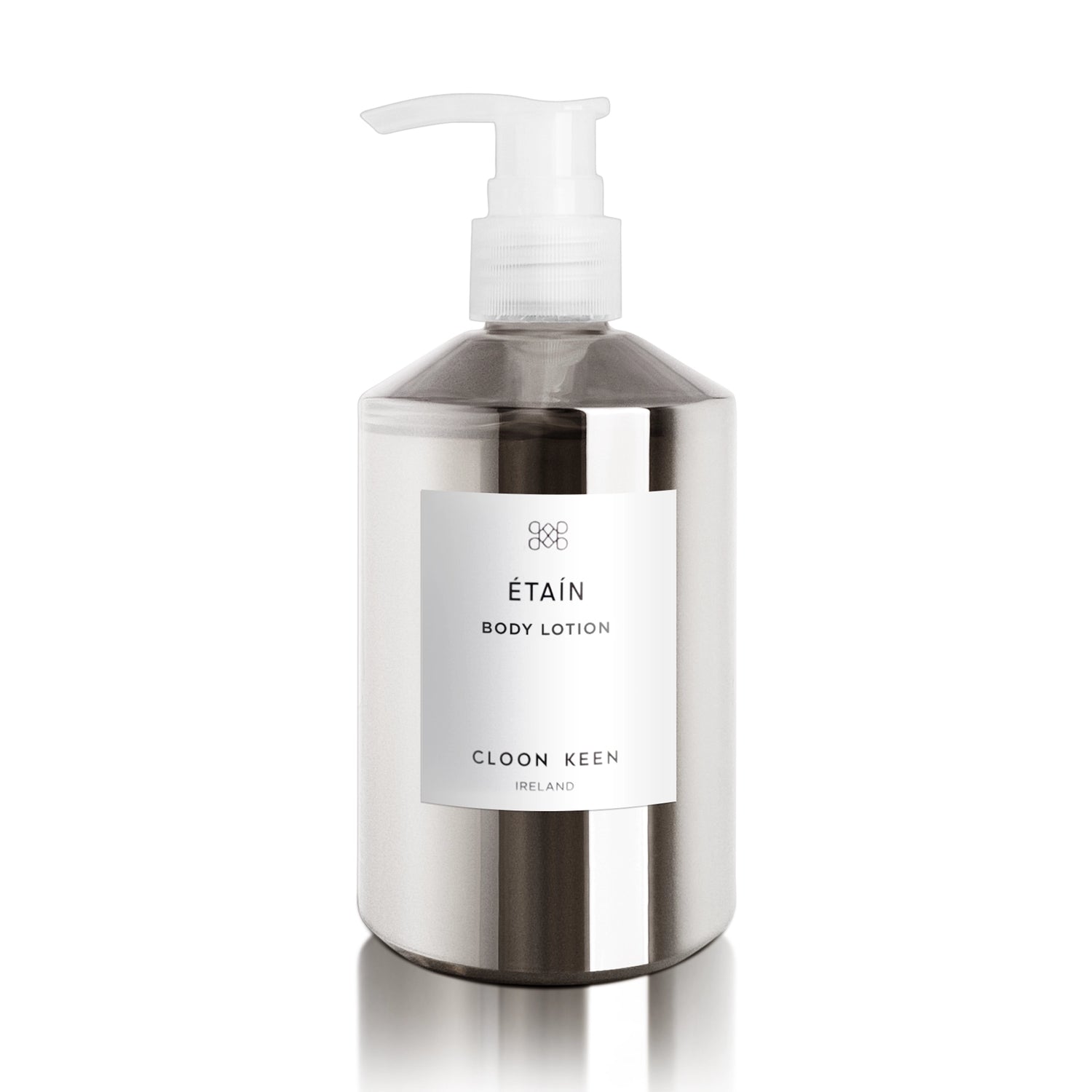 Image of Etain Body Lotion in semi-opaque silver bottle with pump dispenser.
