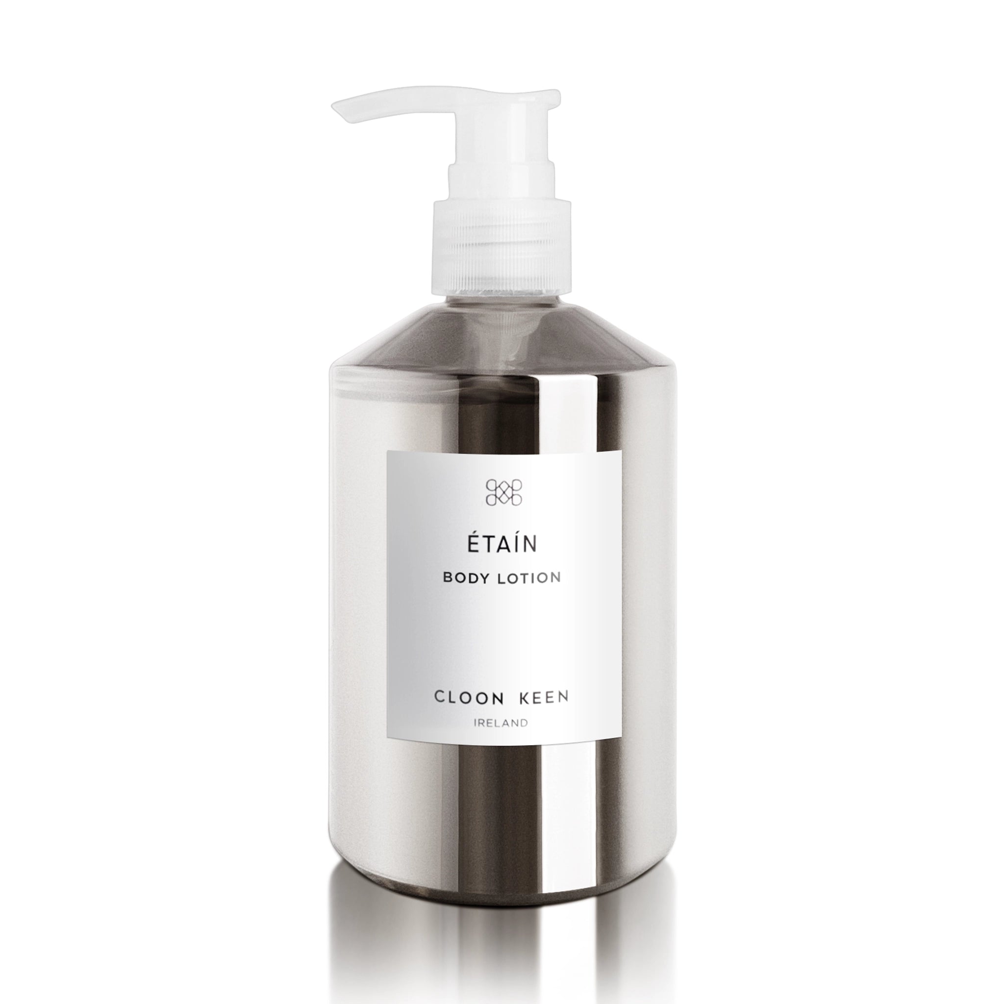 Image of Etain Body Lotion in semi-opaque silver bottle with pump dispenser.