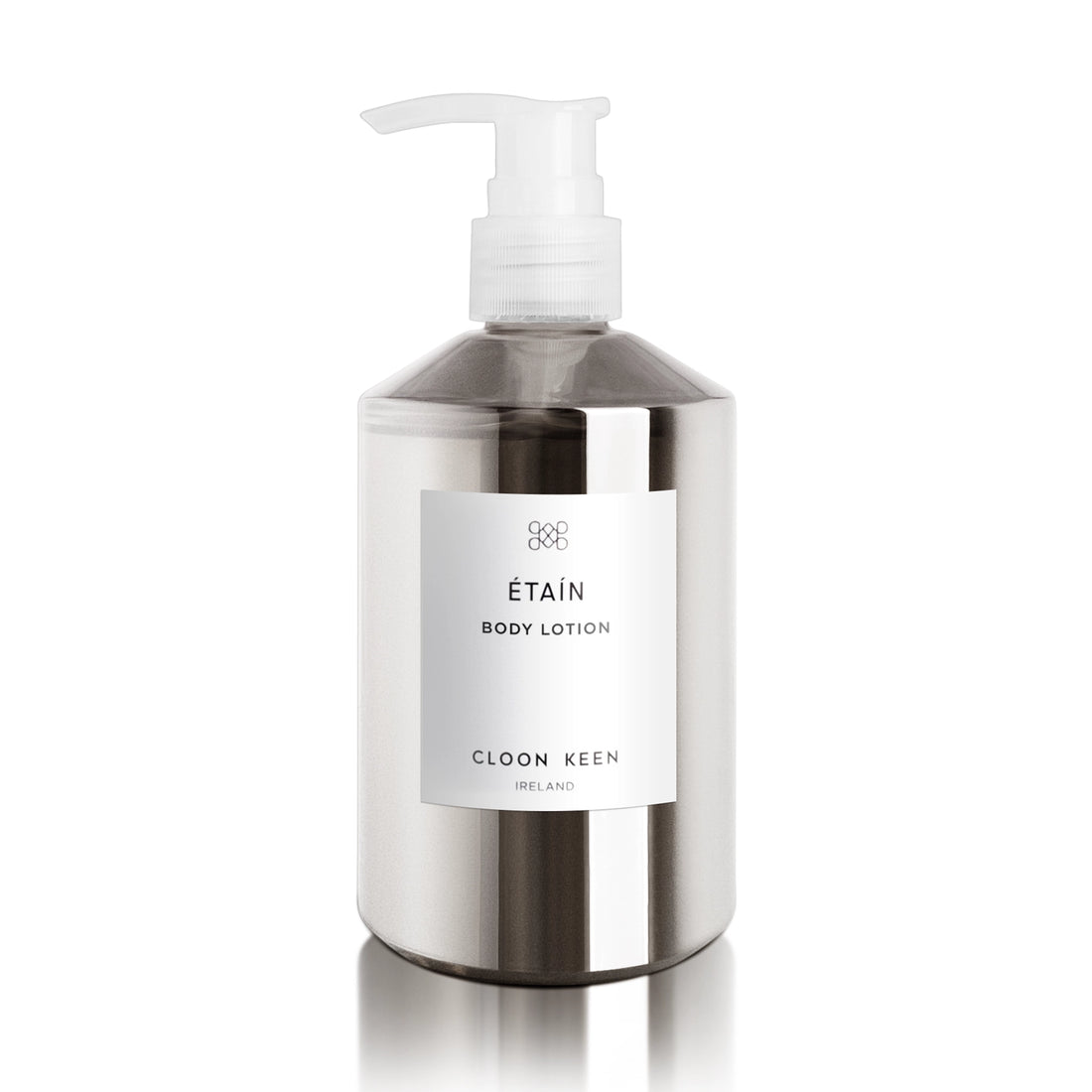 Image of Etain Body Lotion in semi-opaque silver bottle with pump dispenser. 