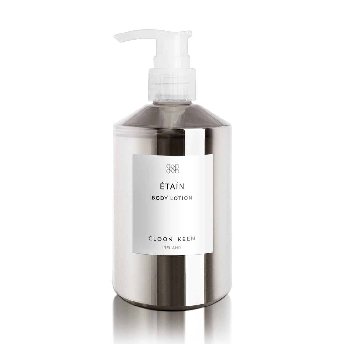 Image of Etain Body Lotion in semi-opaque silver bottle with pump dispenser.